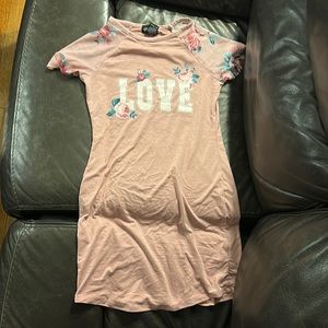 Girls dress with flowers and says “love”